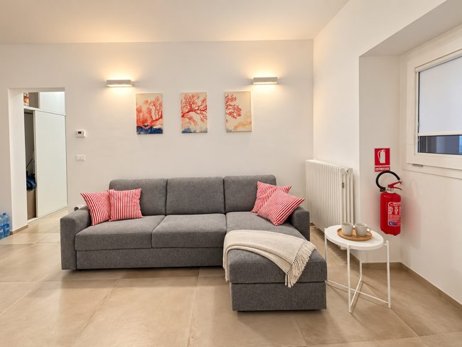 Salotto con divano Sunset Suite